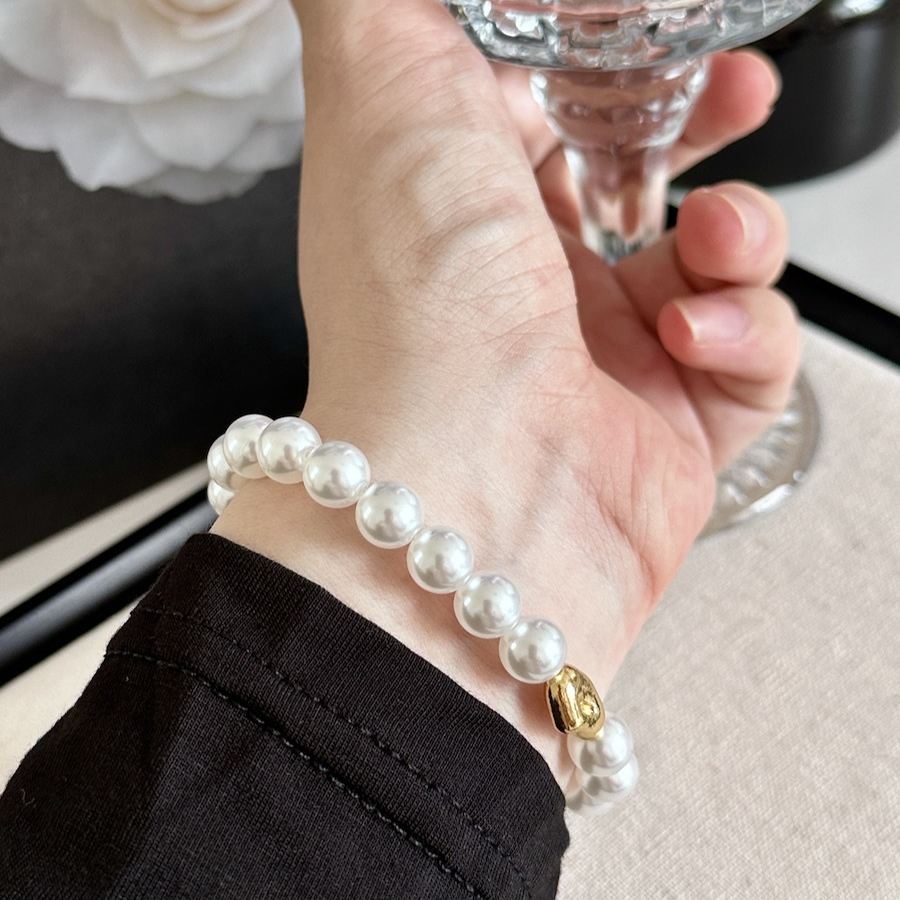 Imitation Australian white faux pearl bungee rope bracelet