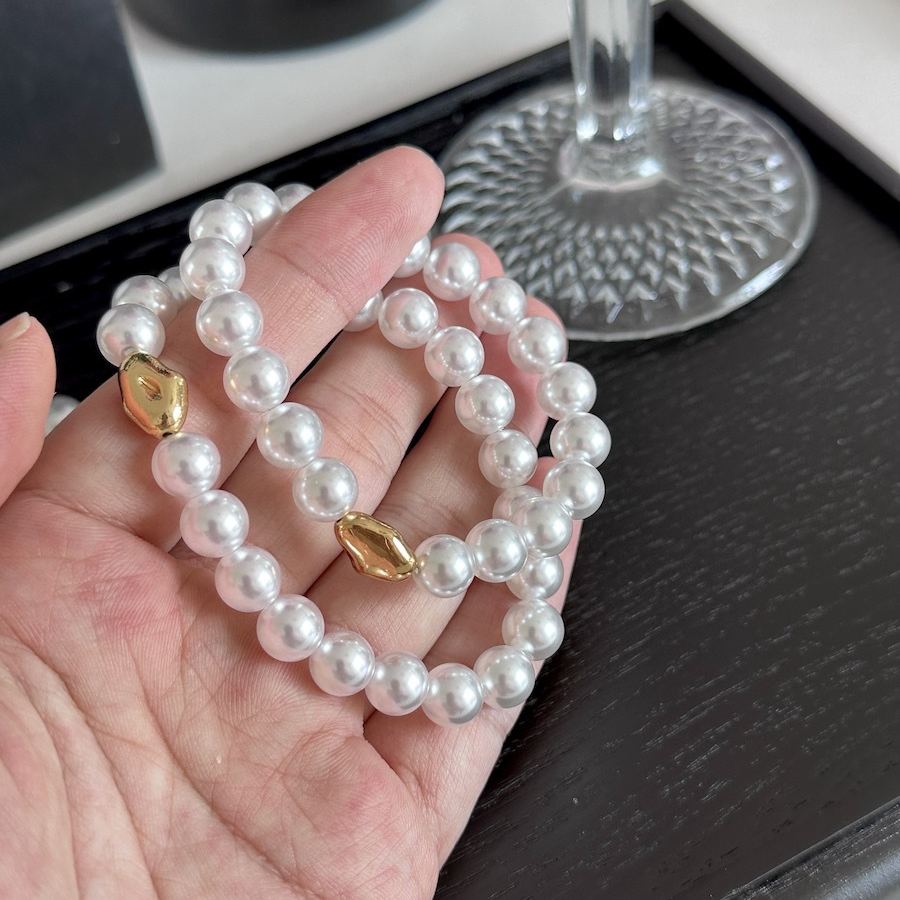 Imitation Australian white faux pearl bungee rope bracelet