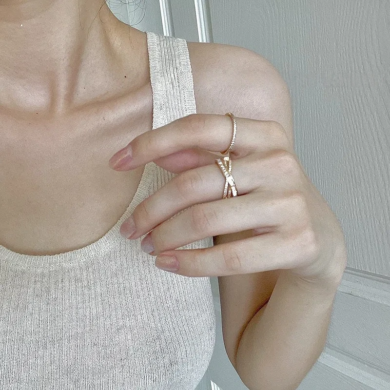 Cross-wrapped gold rings