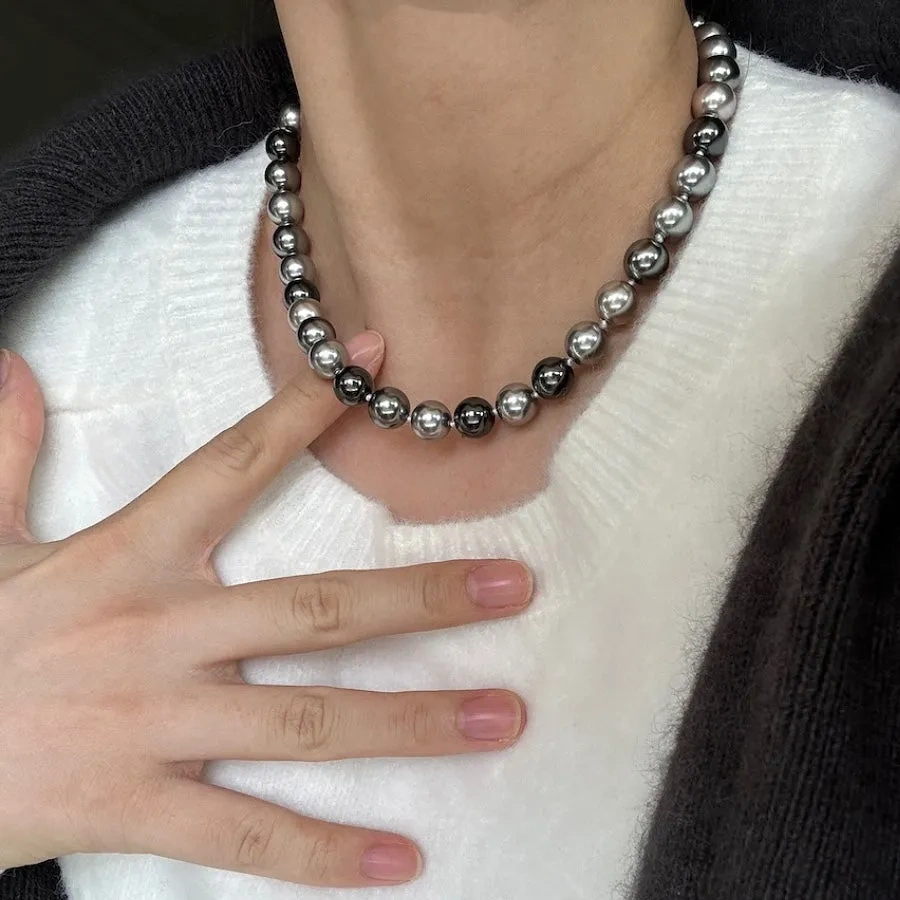 Necklace of faux melange gray-green pearls