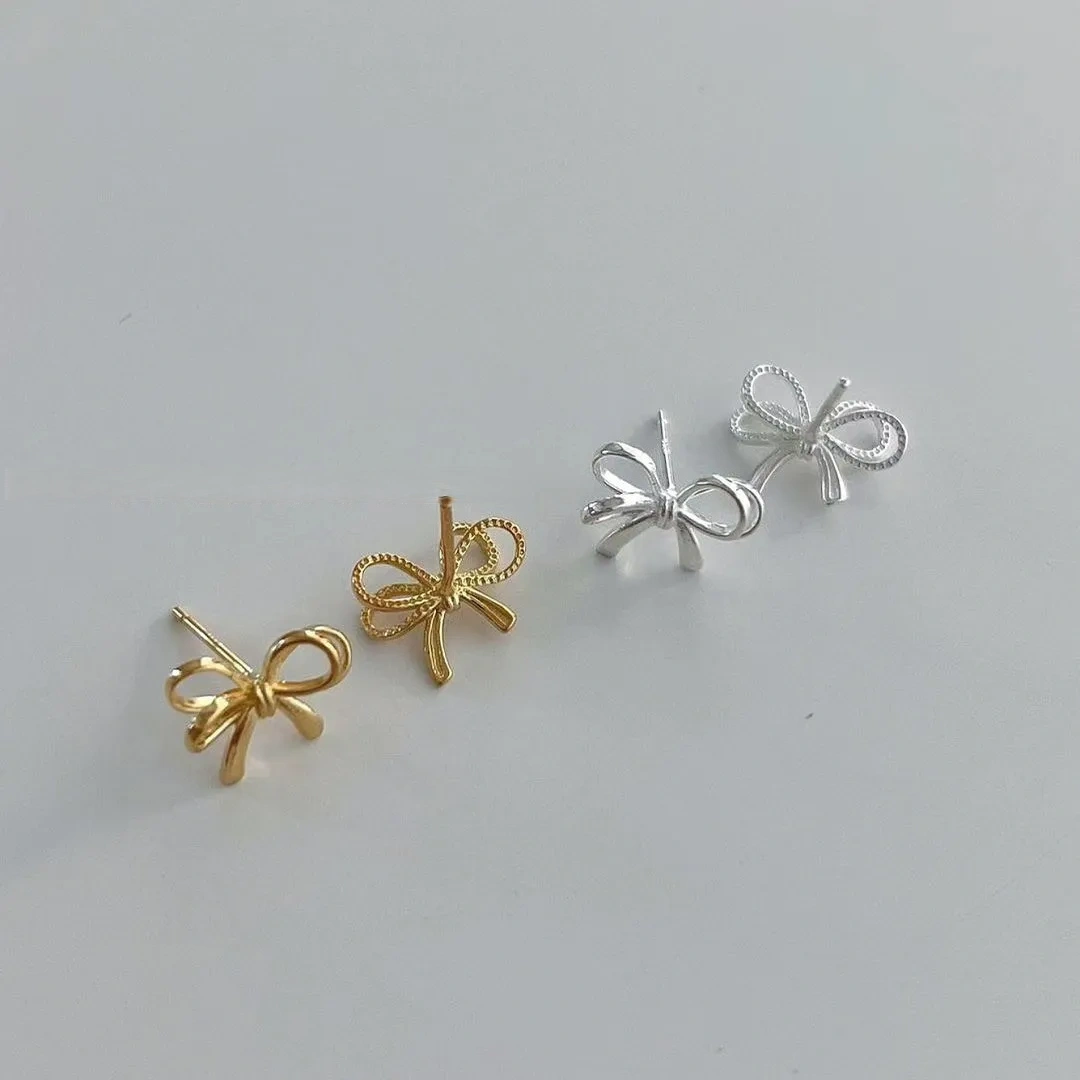 925 silver bow cut-out earrings