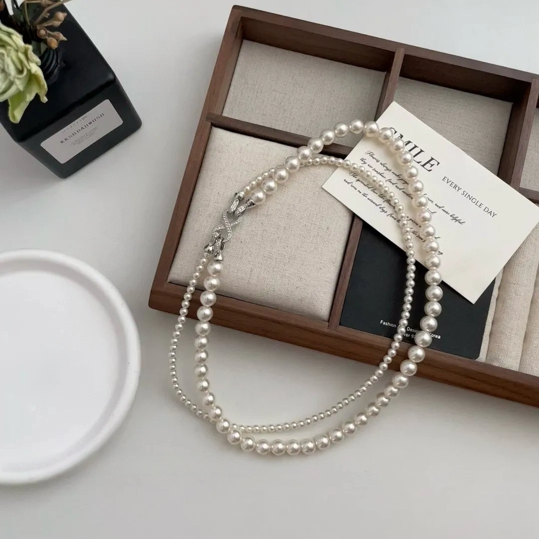Figure-eight buckle gray double-layered pearl necklace