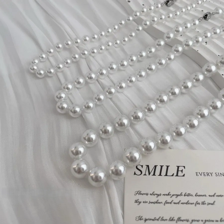 Faux Australian white pearl knotted necklace