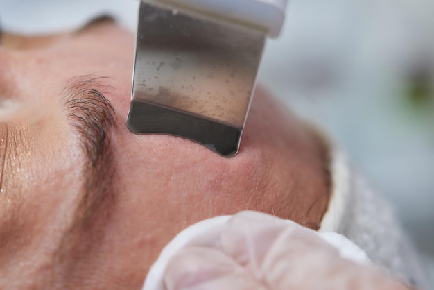 Premium Photo | Woman getting ultrasound skin cleaning at beauty salon