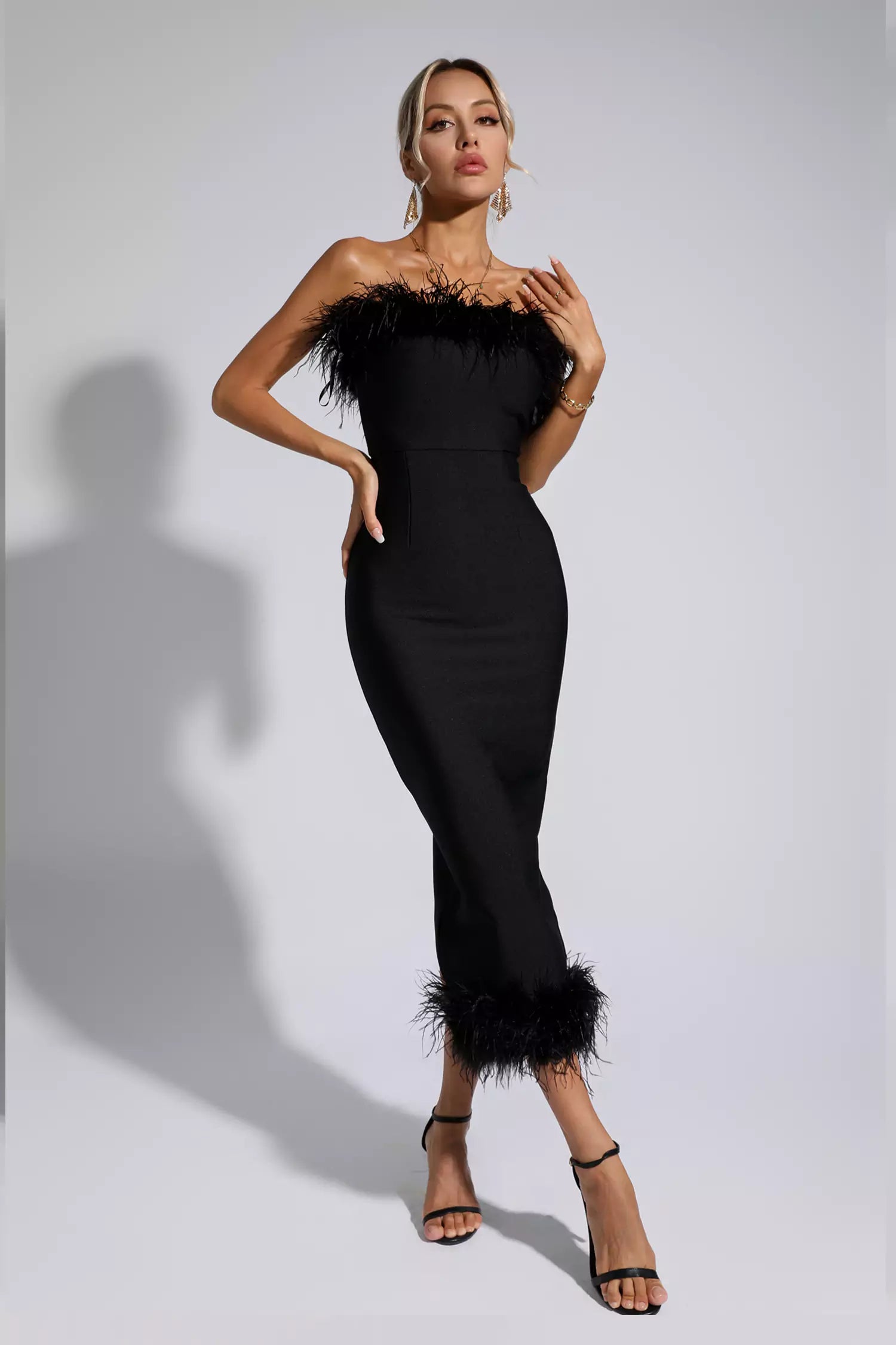 Black dress with 2025 feathers on top