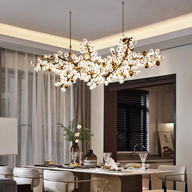 The Zylero Grapevine Chandelier brings a touch of natural elegance to your dining room, with its handcrafted branches and grape-inspired cups casting a warm, inviting light.