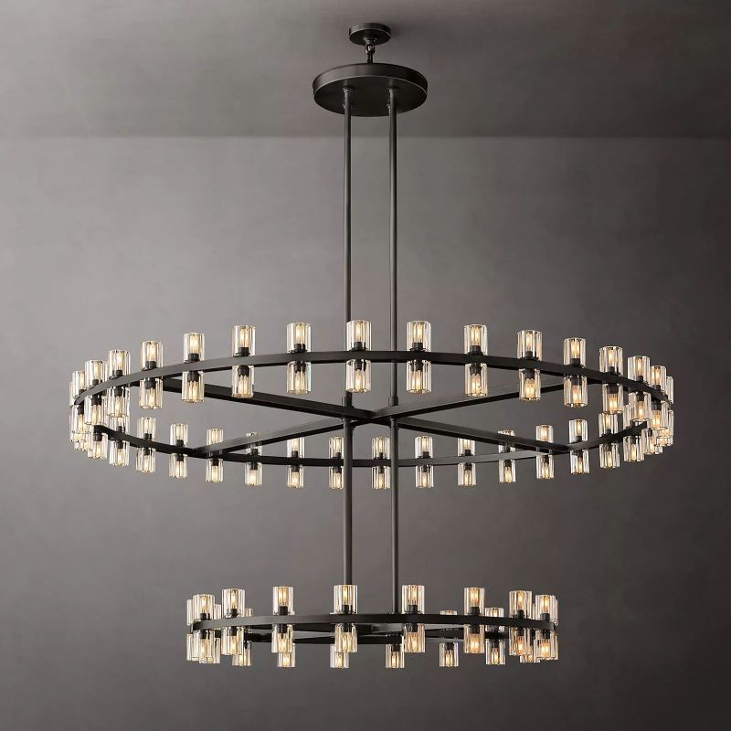 The black chandelier by Zylero showcases a bold design, featuring crystal glass accents that enhance its contemporary, industrial aesthetic.