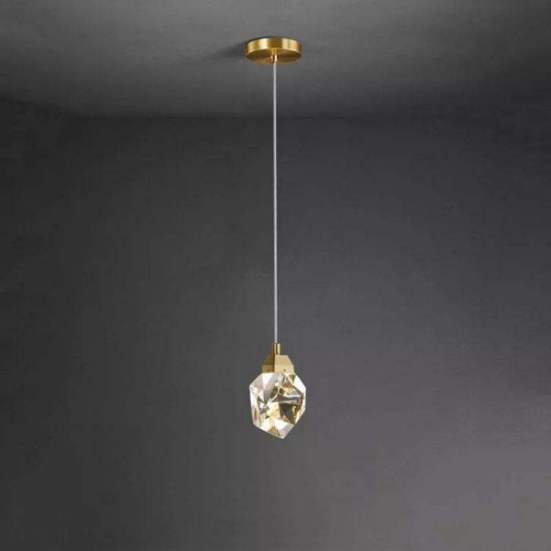 Exquisite Zylero Crystal Pendant, showcasing hand-polished crystal and brass accents, perfect for adding a touch of luxury to any room.