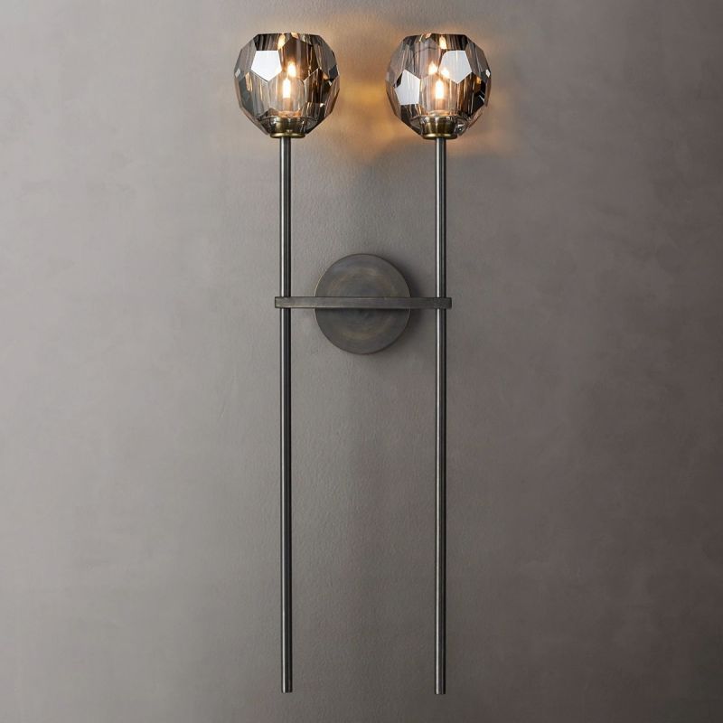 Make a bold statement with Zylero's Black Wall Sconce, featuring crystal glass that enhances the room's contemporary appeal.