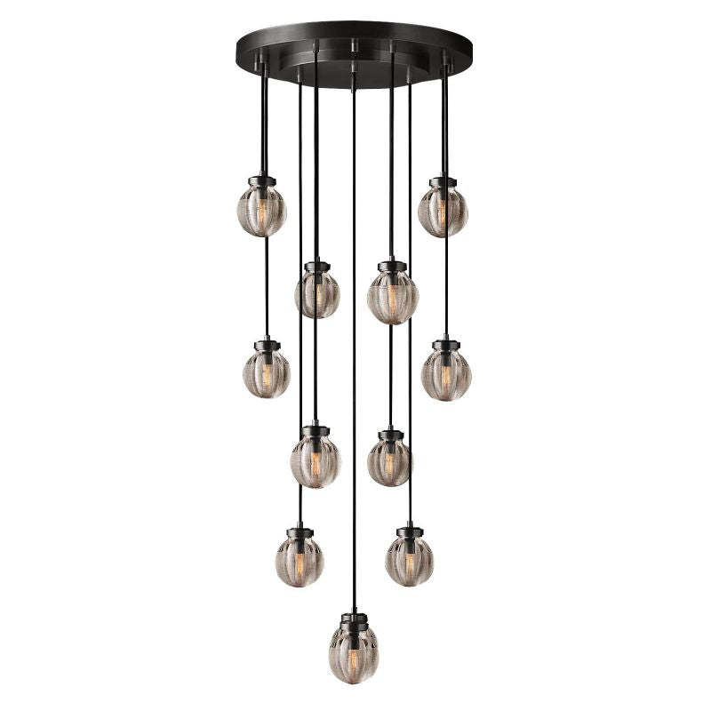 Make a bold statement with Zylero's Black Chandelier, where the contrast of black and crystal glass enhances the living room's elegance and charm.