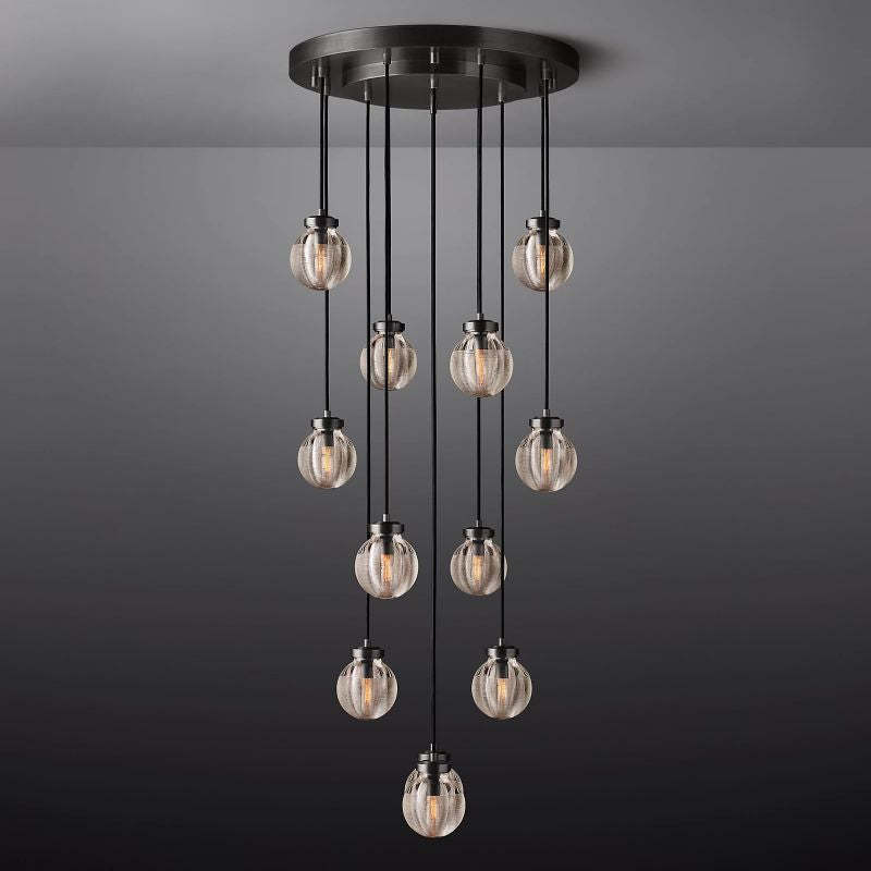 The Zylero Black Chandelier adds a sophisticated touch to your living room, its dark, lustrous finish complementing the hand-carved crystal glass for a modern aesthetic.