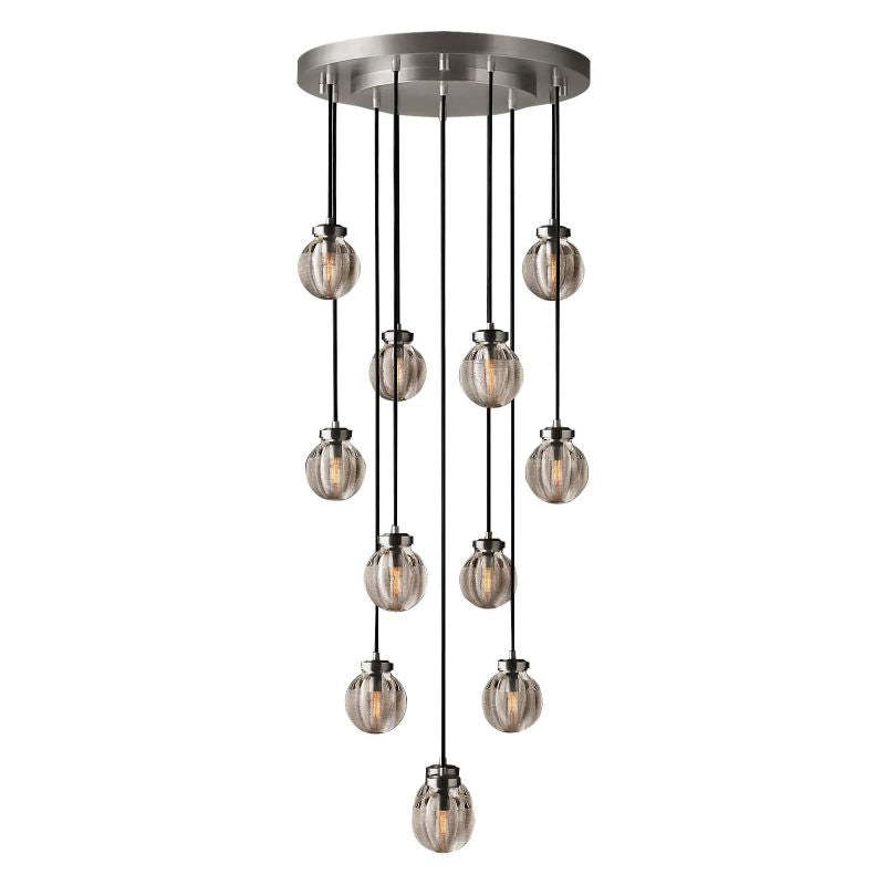 Illuminate your living space with Zylero's Silver Chandelier, its silver and crystal elements combining to create a luminous, nature-inspired atmosphere.