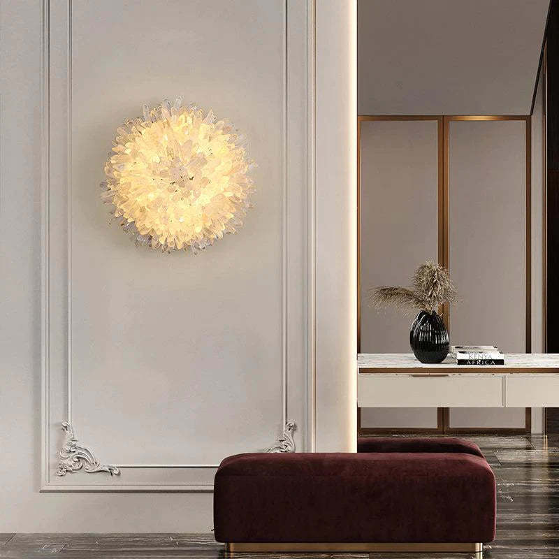 Zylero's Crystal Lighting: Illuminate your living room with Zylero's sconce, showcasing a blend of hand-carved crystal and brass.
