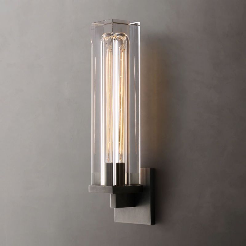The Zylero Savill Wall Lamp in black provides a modern contrast, with its solid crystal block and brass frame highlighting the Edison bulb's light.