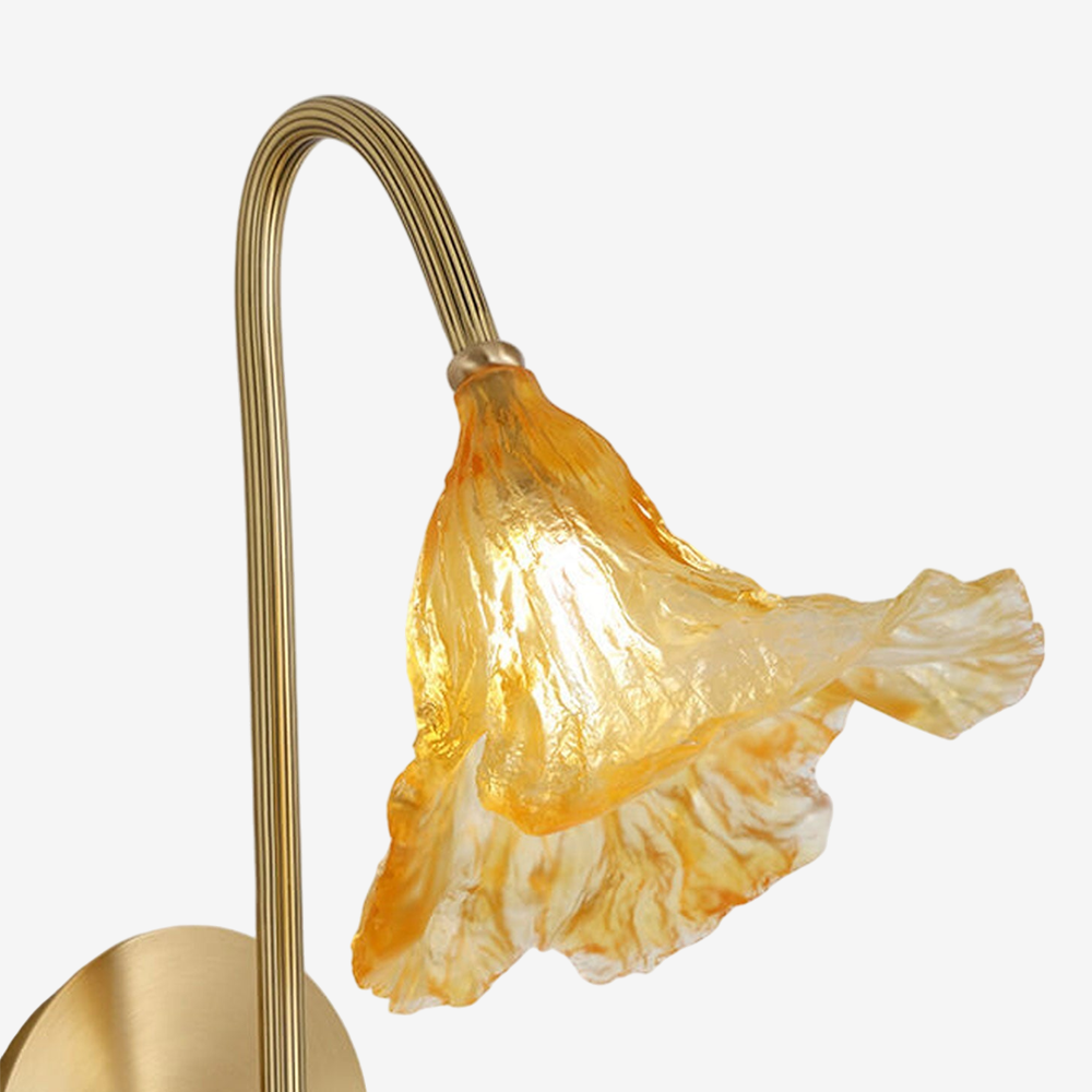 The Zylero Lotus Leaf Sconce's shade is a masterpiece of design, with its intricately curved silhouette mimicking the subtle beauty of a lotus leaf.