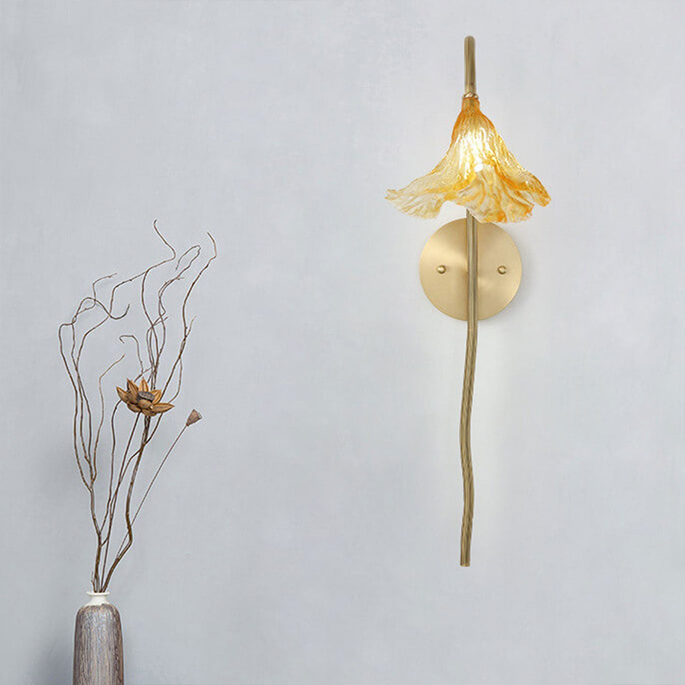 Illuminate your living room with the Zylero Lotus Leaf Wall Sconce, where the beauty of lotus leaves is captured in a sconce that provides a gentle, soothing light.