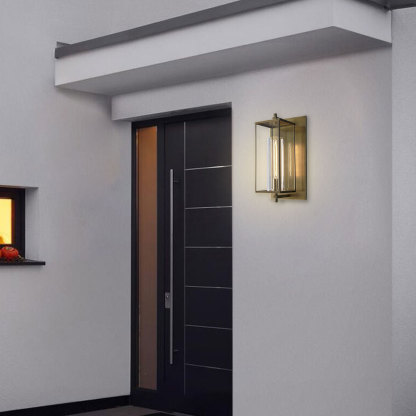 A lit on gold  Outdoor Square Wall lights beside  the door