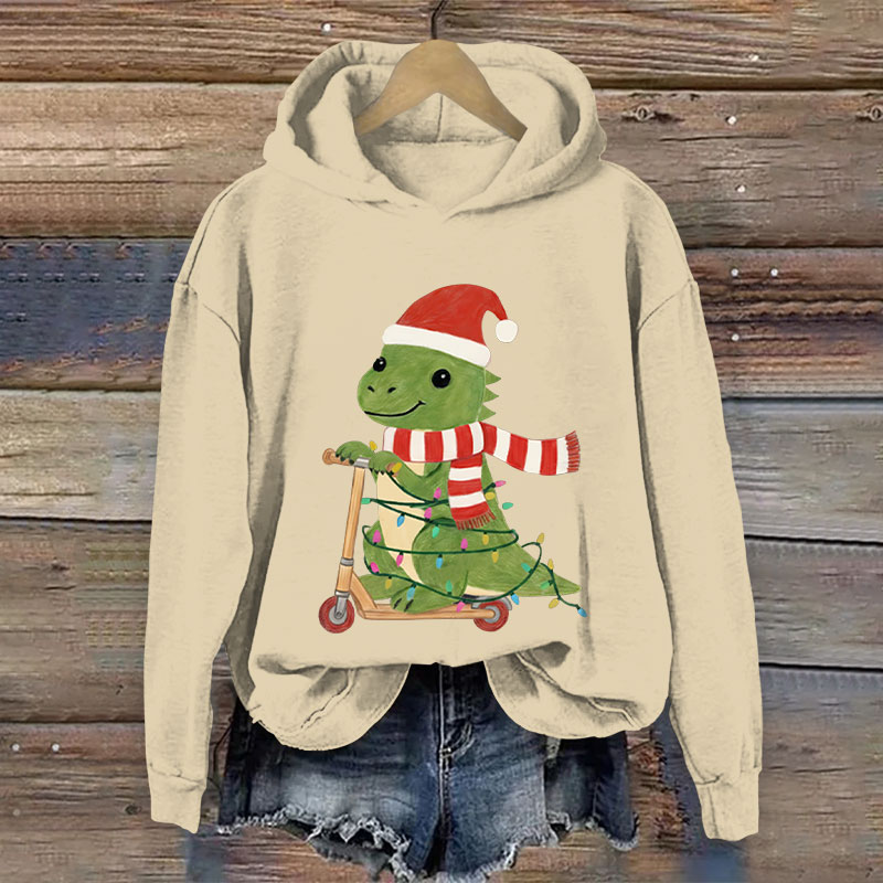 100% Cotton Women's Christmas Cute Dinosaur Riding A Scooter Print Hoodie - Apricot - US16-18(2XL) - image 1