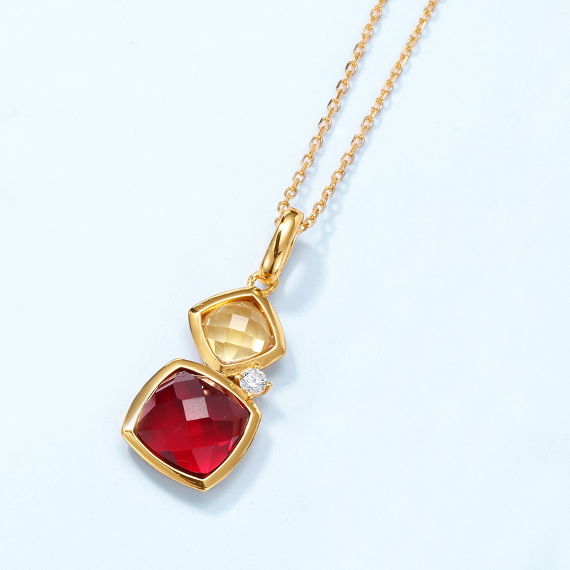 Deep red garnet color necklace with geometric cut pendant
