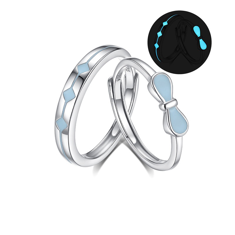 Glow in the dark couple rings in silver with bow and diamond designs