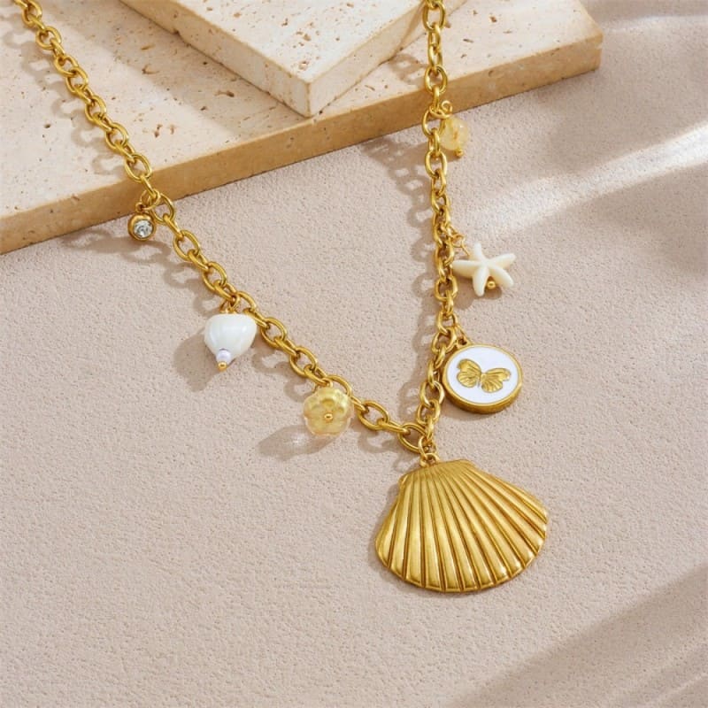 Gold Stainless Steel Necklace – Shell, Butterfly & Starfish Pendant