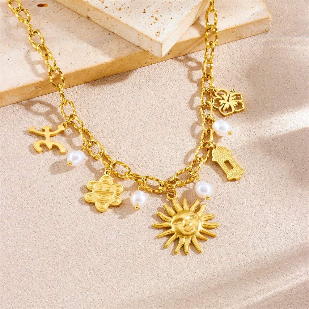Sun Charm Necklace – Gold-Plated Multi-Pendant Chain with Floral & Pearl Accents