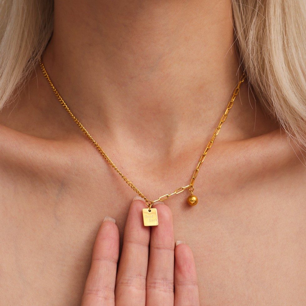 Gold Layered Necklace with “Good Luck” Square Pendant – Mixed Link Design