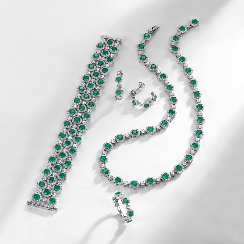 Sterling silver emerald hoop earrings with alternating diamonds