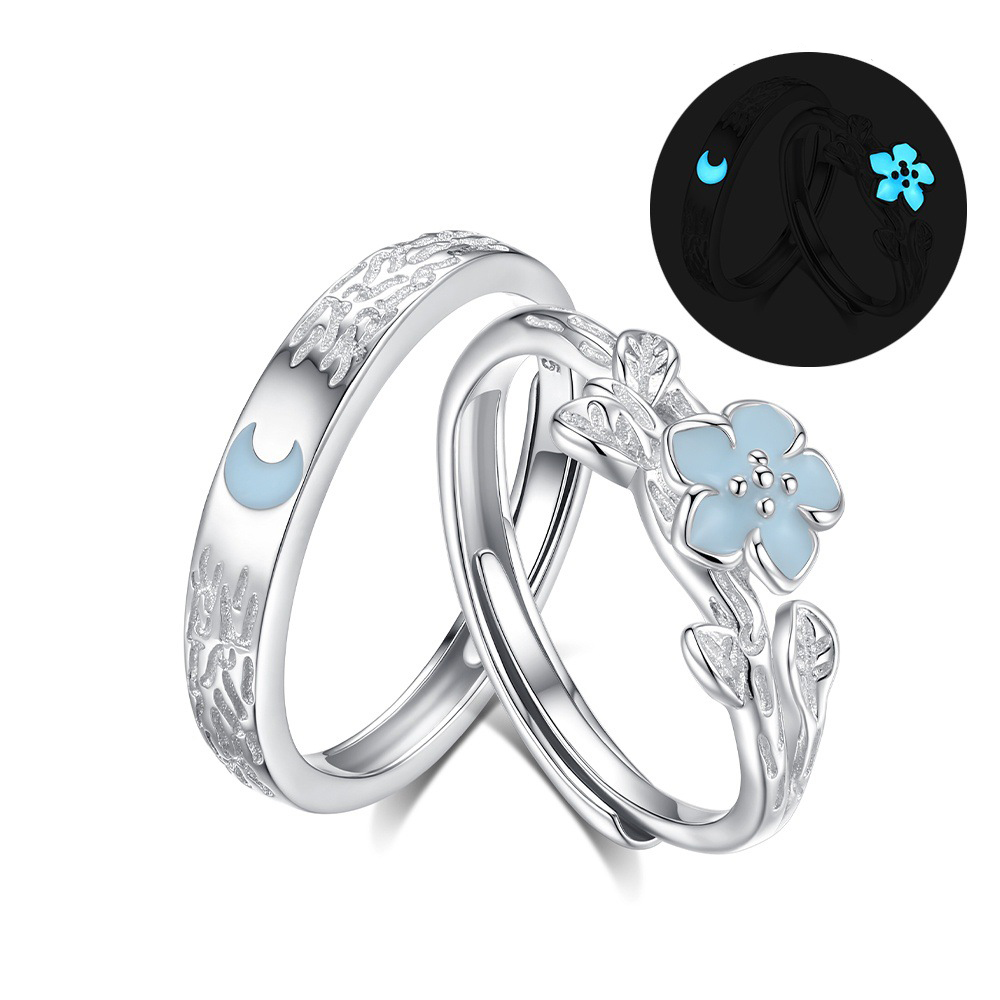 Moonlit Bloom glowing couple rings in sterling silver, side by side