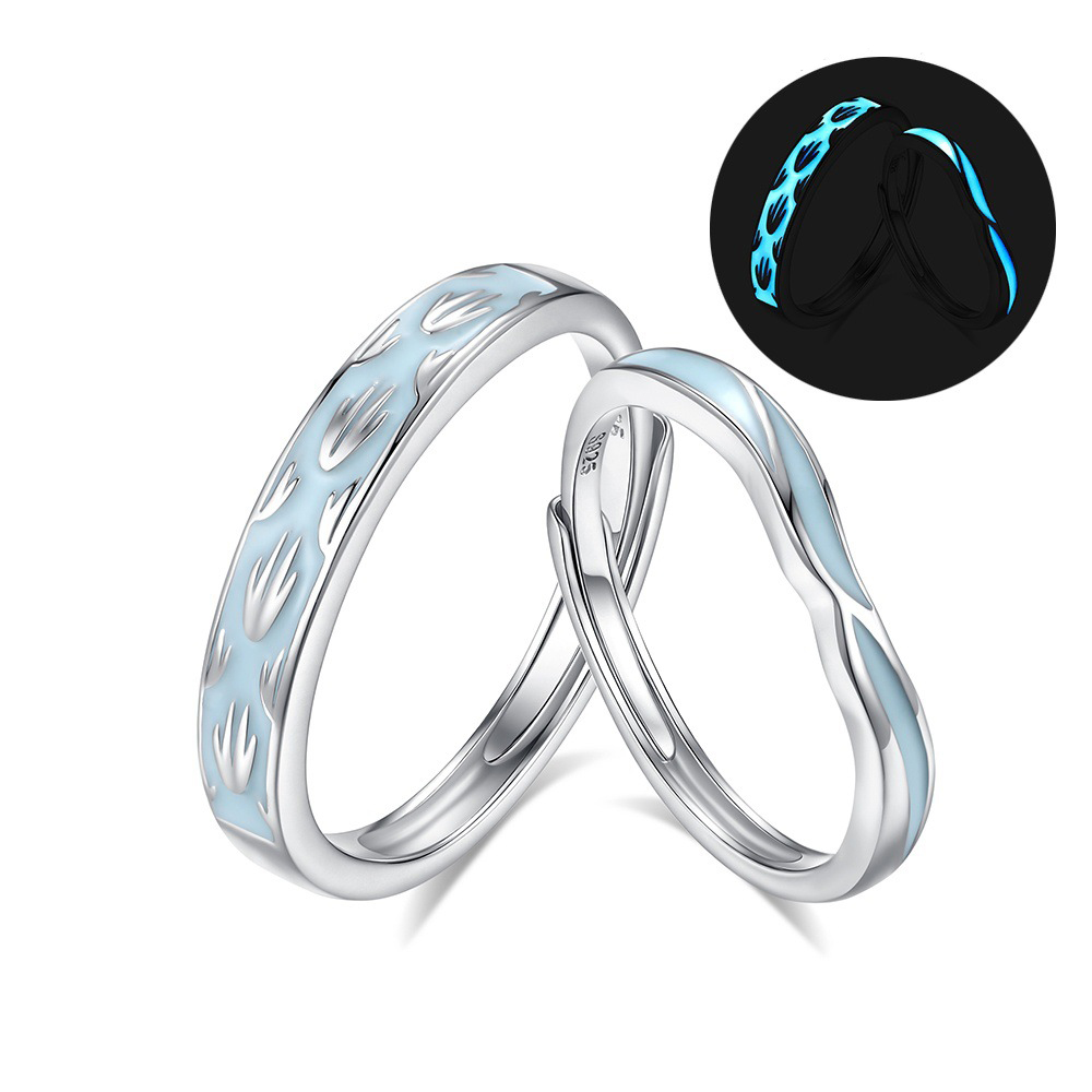 Glow in the dark couple rings made of sterling silver side by side