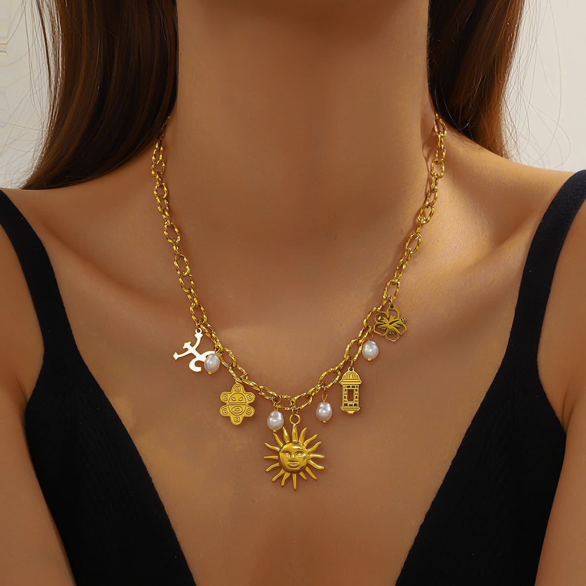 Sun Charm Necklace – Gold-Plated Multi-Pendant Chain with Floral & Pearl Accents