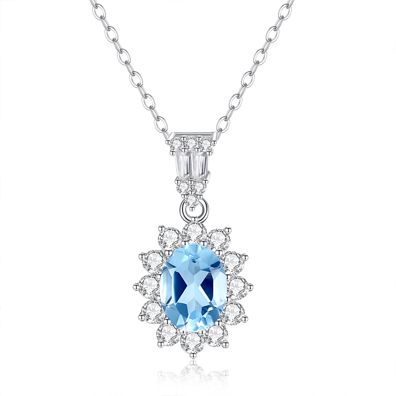 Topaz sunflower pendant necklace – blue crystal in silver setting