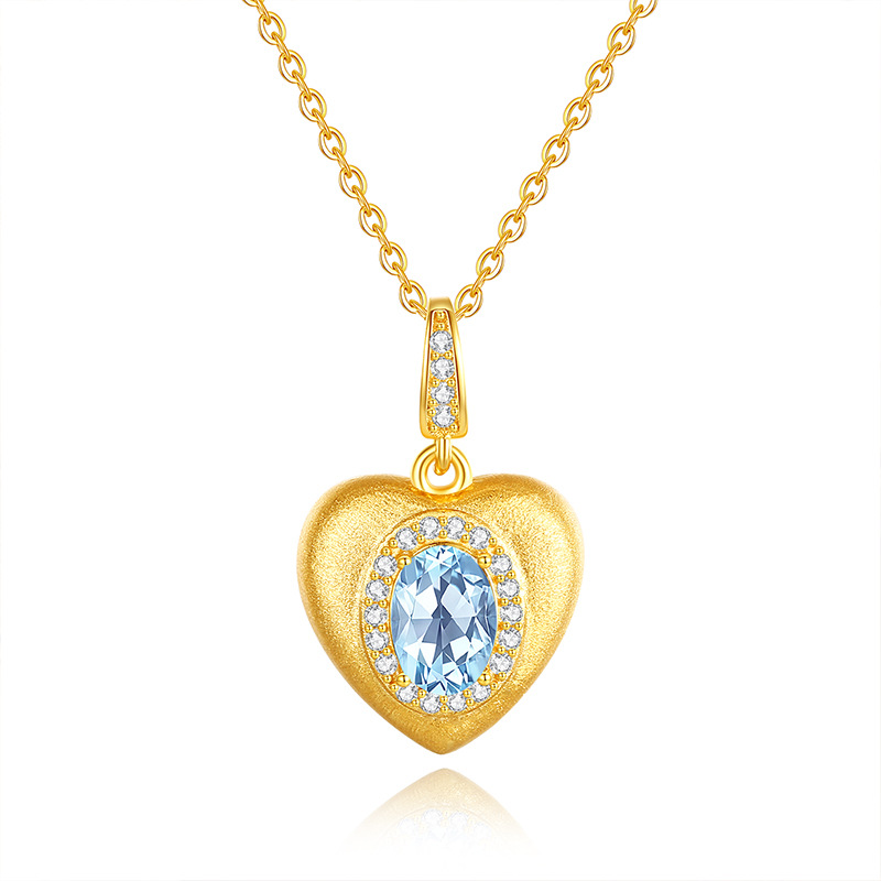 Topaz heart pendant – sky-blue gemstone in brushed heart design