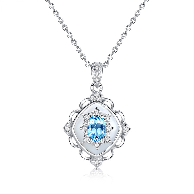 Topaz Geometric Pendant – light blue crystal in silver geometric cut