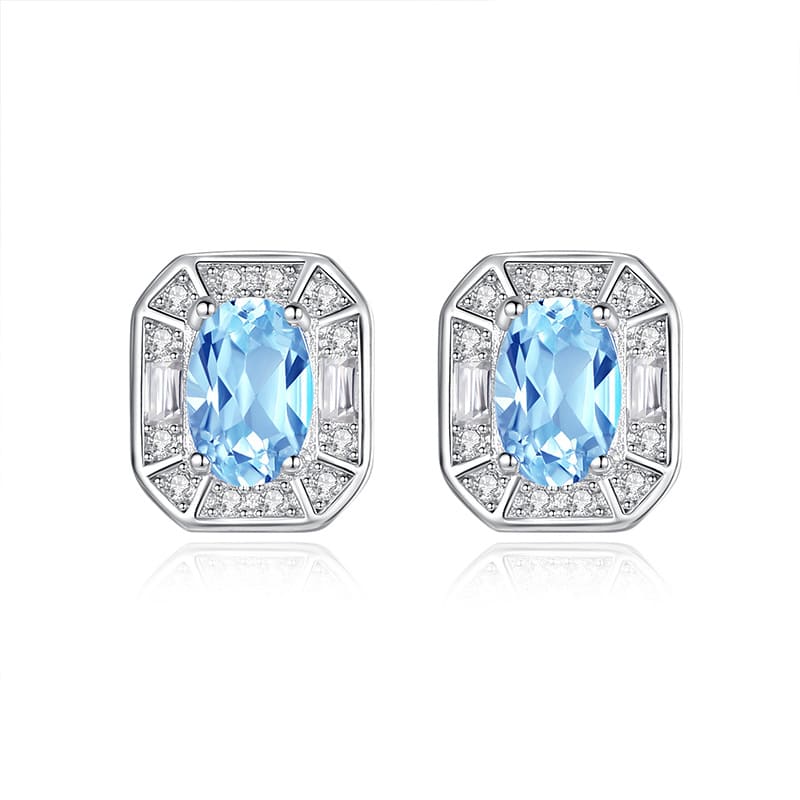 Blue topaz oval silver earrings in modern geometric style – December