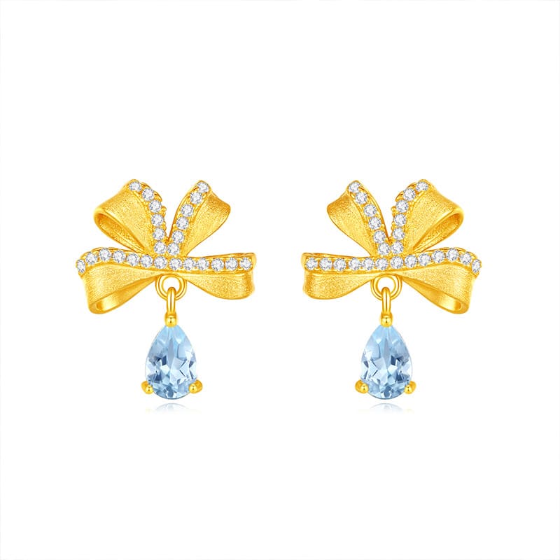 Light blue topaz bow earrings in S925 silver – December birthstone