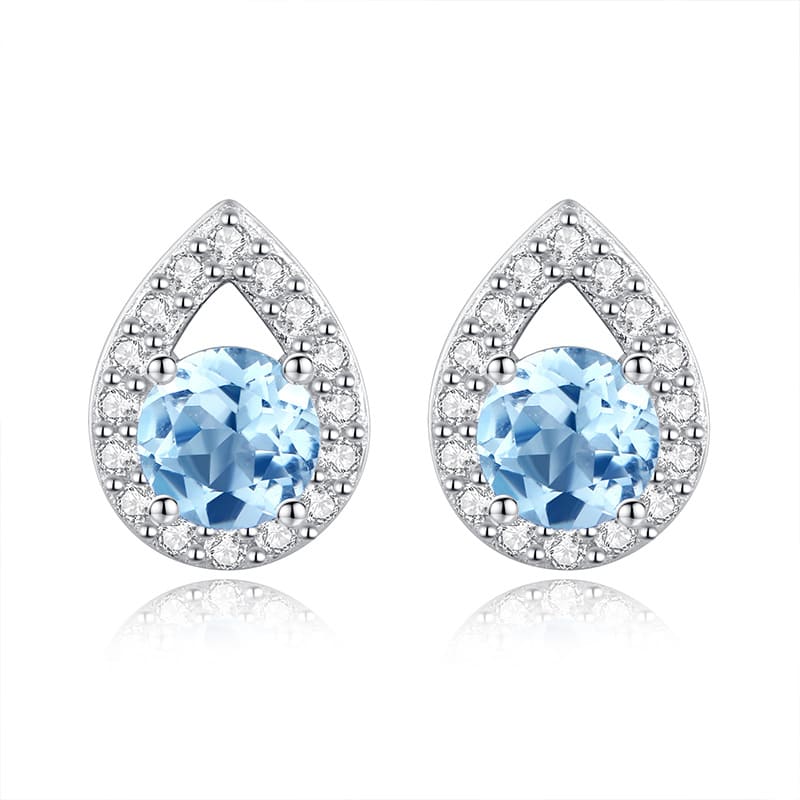 Blue topaz teardrop earrings with polished silver – December birthstone