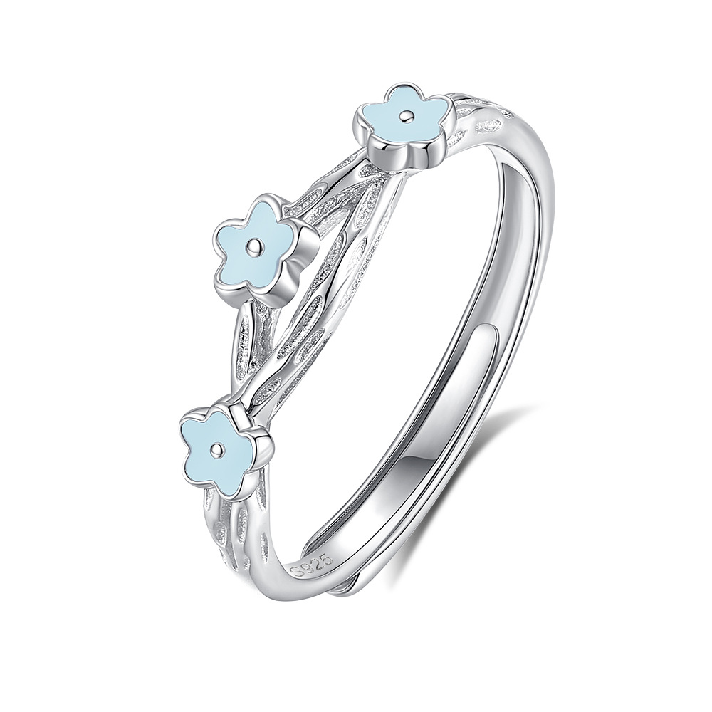 Women’s adjustable fluorescent ring in wave texture, glowing softly