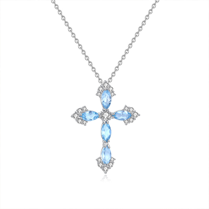 Silver cross pendant with blue topaz stones – Iced out December necklace