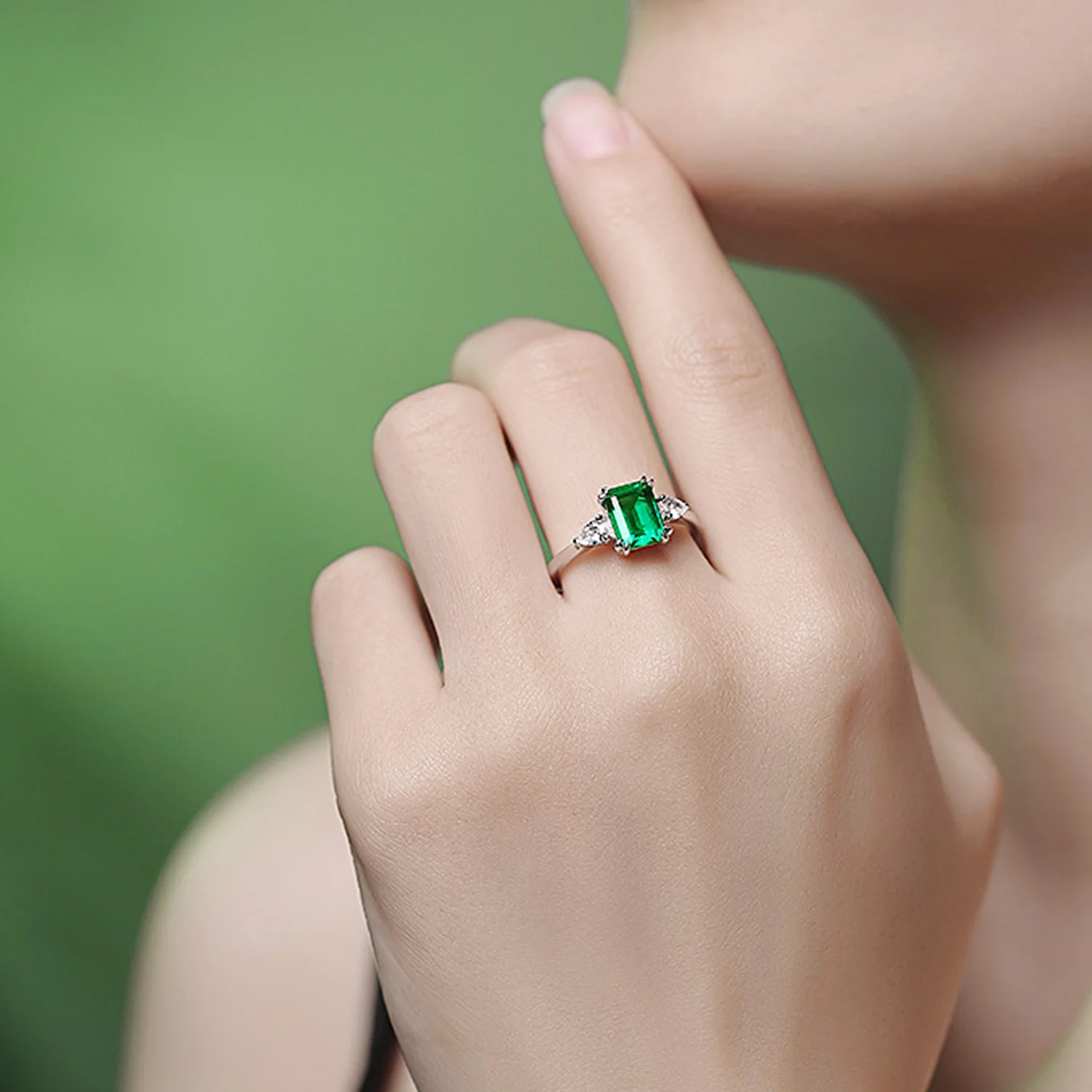May Emerald Rings collection with sparkling green gemstones in sterling silver settings