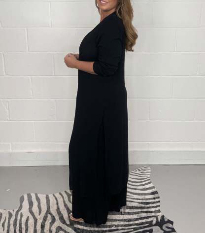 Global Allure: V-Neck Split Luxe Top & Tailored Trousers
