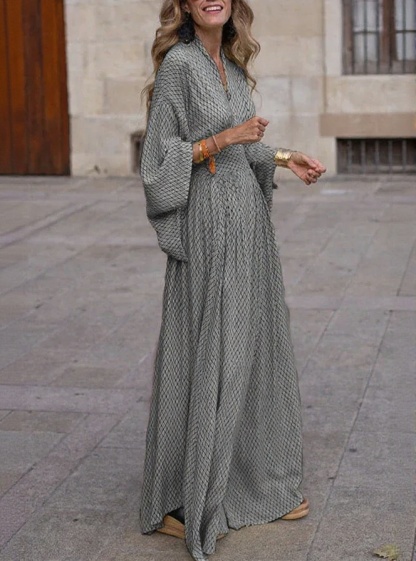 Flowy Printed Maxi Dress with Smocked Waist and Flared Sleeves
