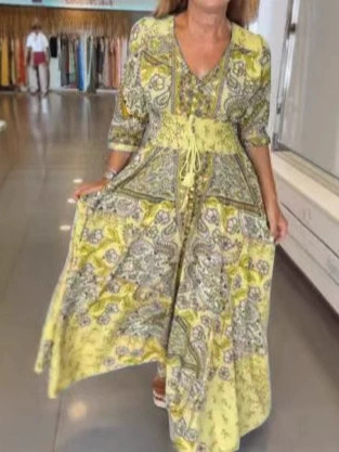 Bohemian Print Maxi Dress Featuring Flowy Silhouette and Smocked Waist
