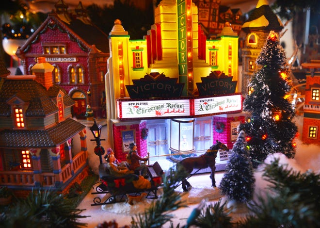 Nancy Campanaro spends days setting up her Christmas village tree adorned with Lemax, Mr. Chrismas and other brands of Christmas villages.