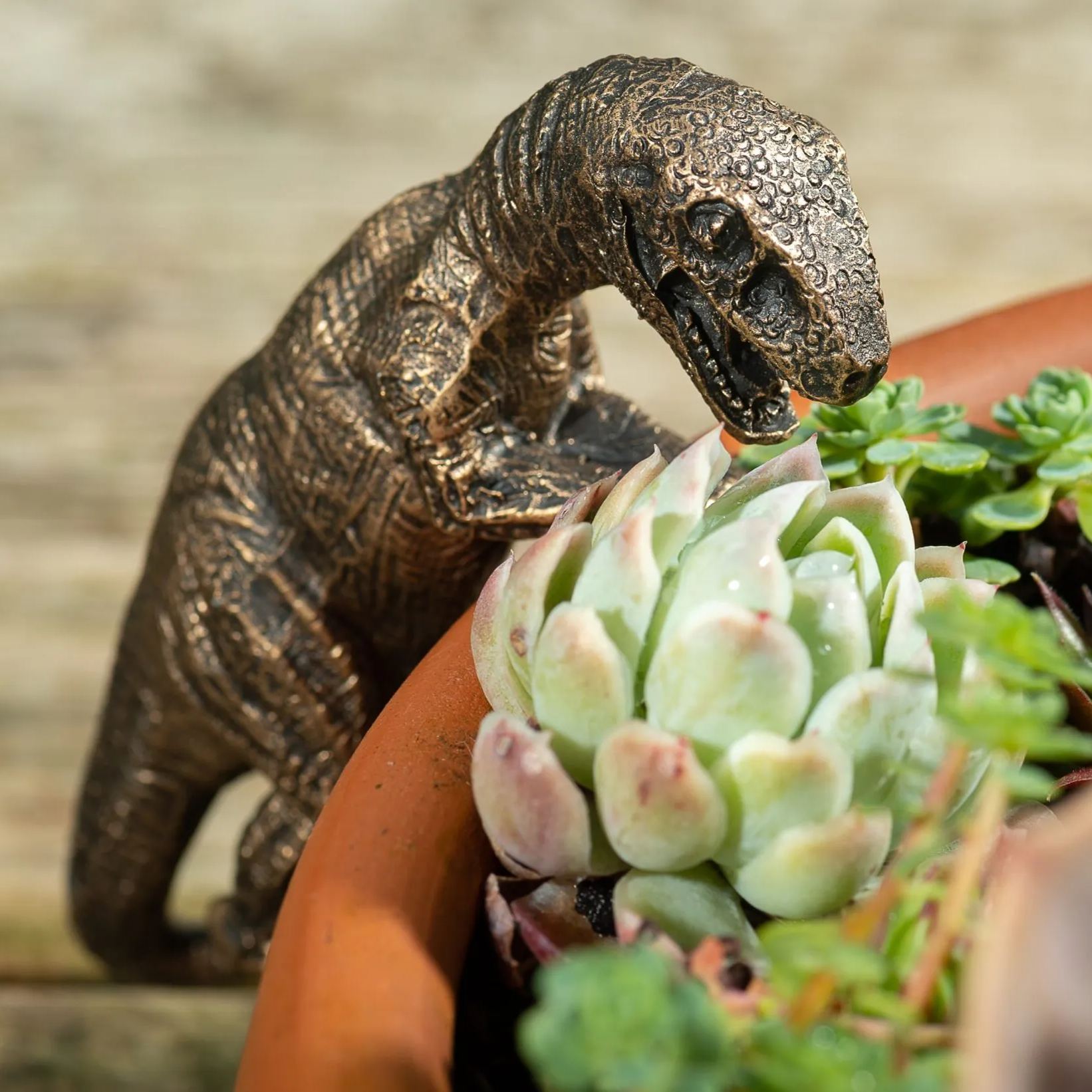 Bronze Velociraptor Pot Buddy