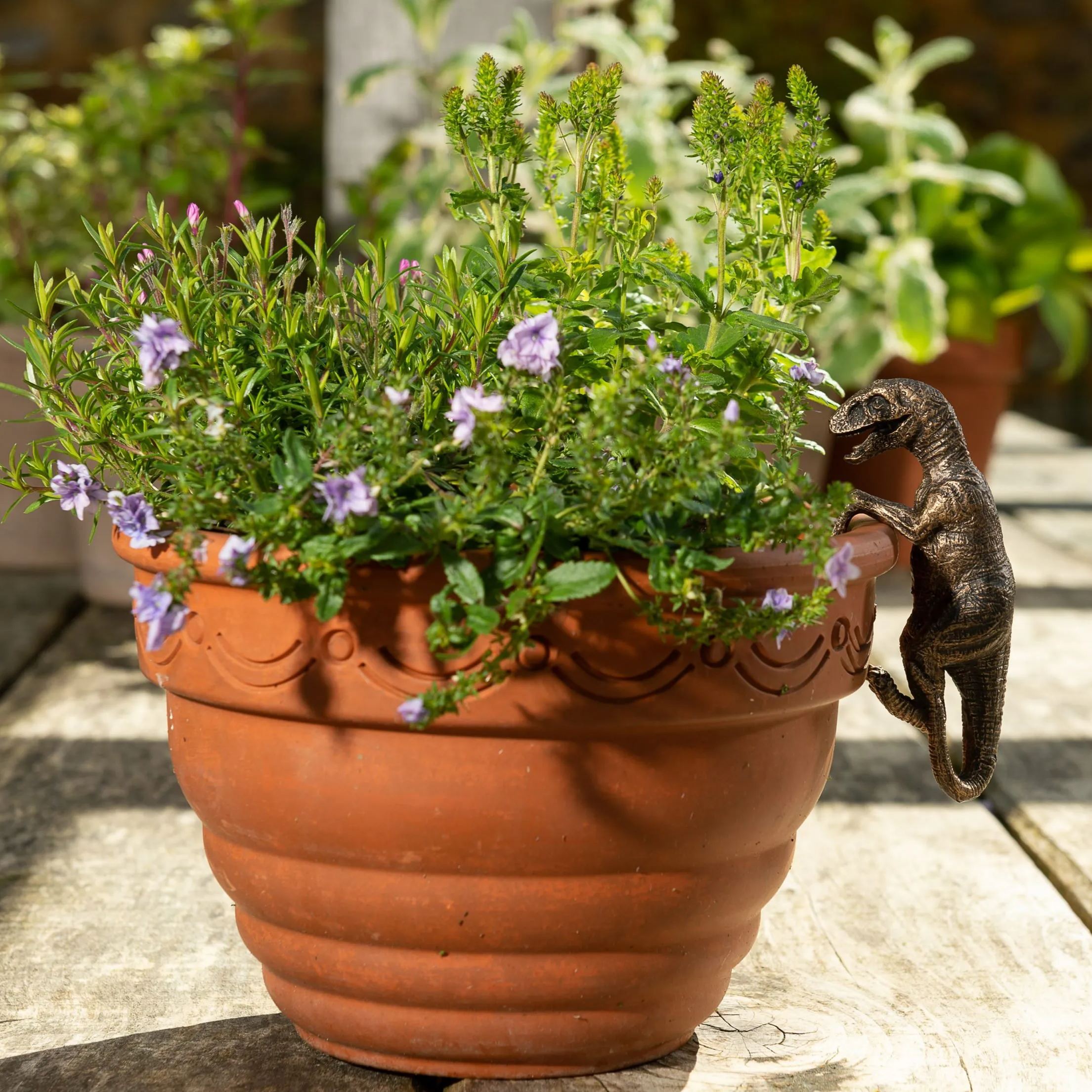 Bronze Velociraptor Pot Buddy
