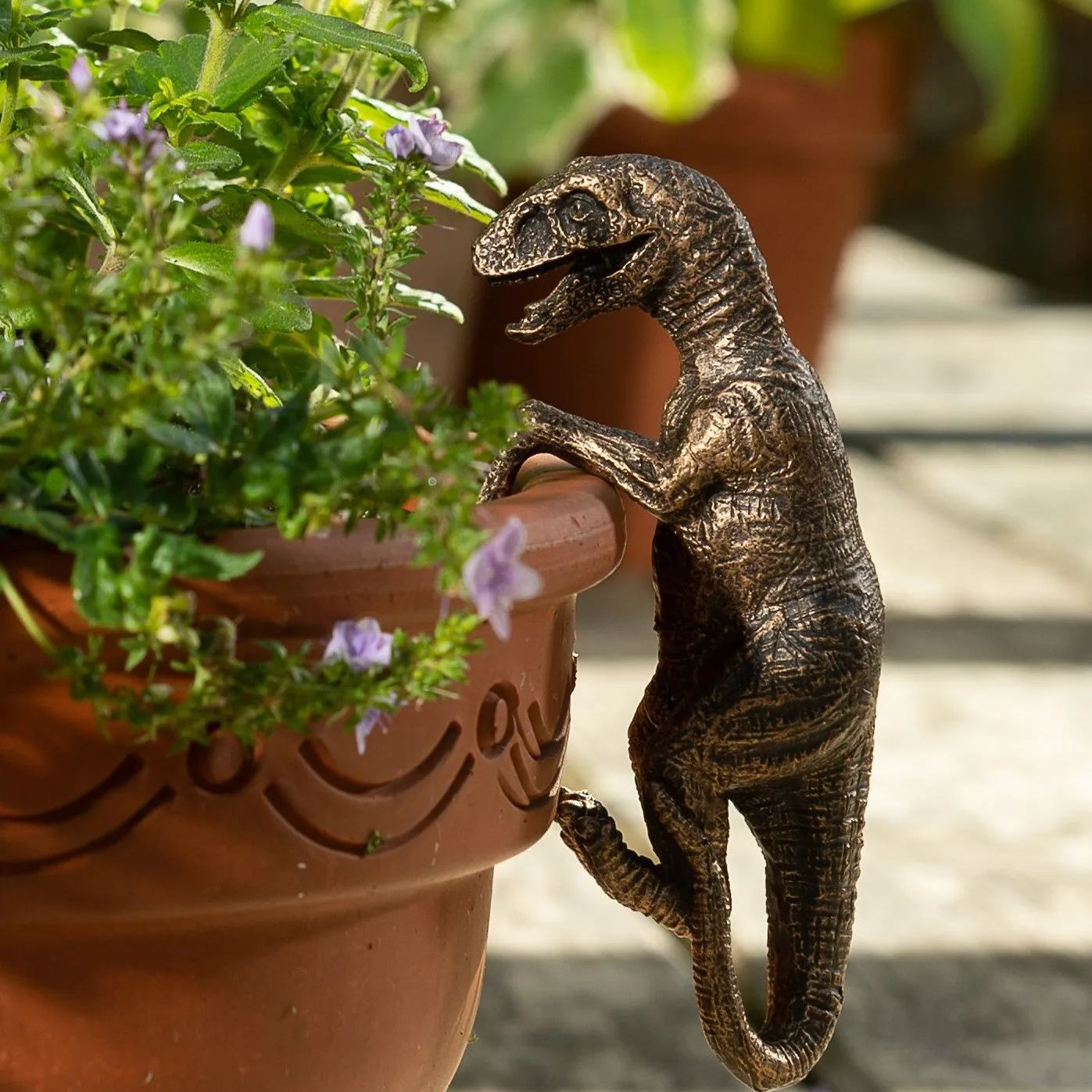 Bronze Velociraptor Pot Buddy