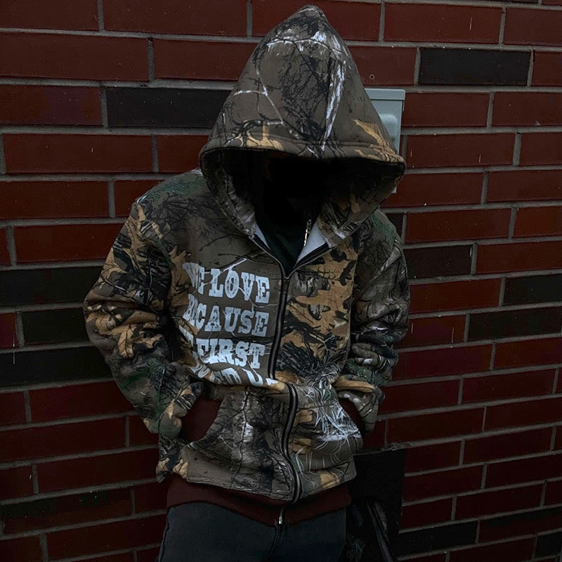 Unisex We Love Because He First Loved Us Dead Leaves Camouflage Print Zipper Hoodie - image 1