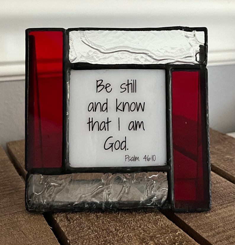 Psalm 46 on a small stained glass frame Be still and know that I am God Bible verse image 10