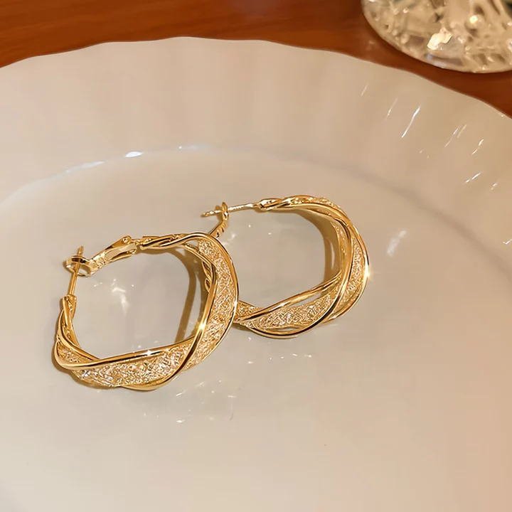 🔥 Sconto del 50% - - 🎁Orecchini intrecciati alla moda